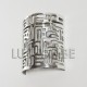 Aplique de aluminio calado con escritura cuneiforme